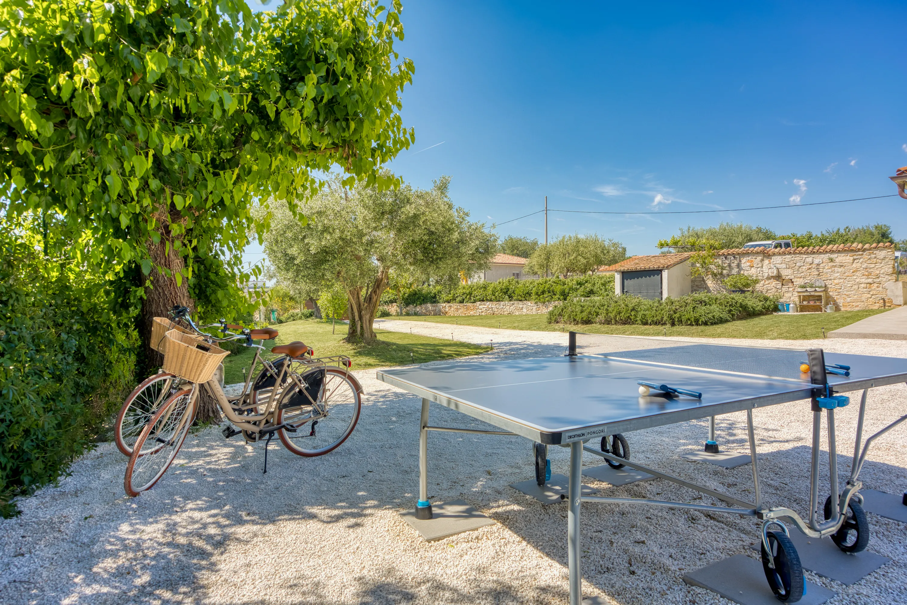 Private courtyard with table tennis and bicycles